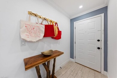 Mudroom with crown molding