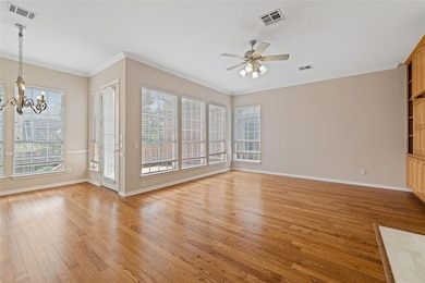 Unfurnished living room featuring baseboards, vis