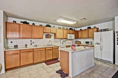 Island kitchen with plenty of cabinets