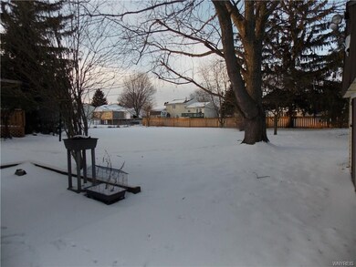 nice sized back yard with mature shade trees