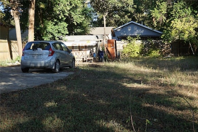 View of yard featuring view of scattered trees