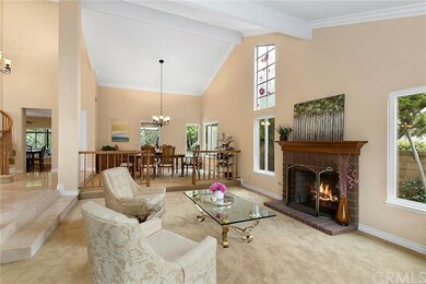 Sit in front of the cozy brick fireplace in your f