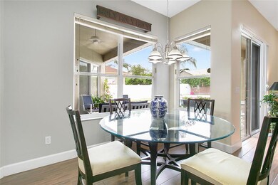 Dining nook with view of pool