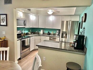 White Shaker Cabinets with Granite