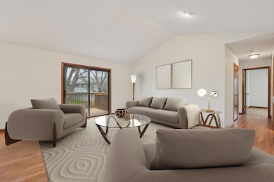 Living room w/deck to relax & enjoy! virtually staged
