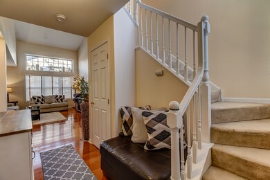 Spacious foyer with coat closet and room to take o