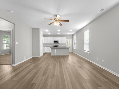 As you walk into the home you are greeted by the l