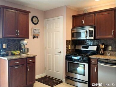 Kitchen Quartz counters plus recessed light and a 