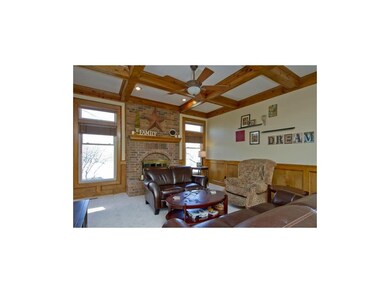 LOTS OF LIGHT SHINES INTO GREAT ROOM.