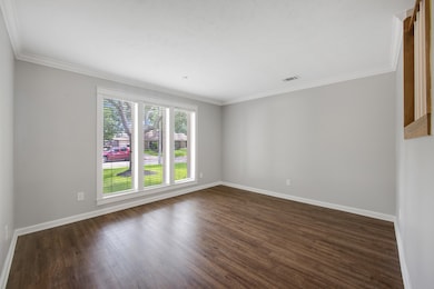 The formal living room, situated to the left of th