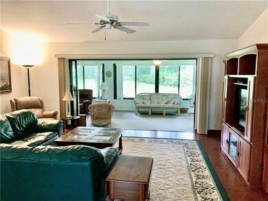 Entering the front door, living room, pocket door 