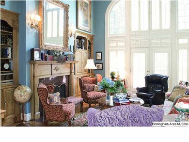 DEN/FAMILY ROOM.  FIREPLACE WITH BOOKCASES ON EACH