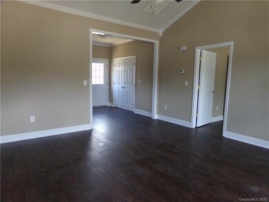 Living room looking towards kitchen