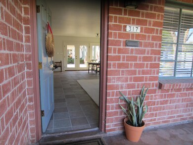 Updated tile floors and french doors