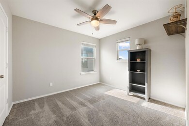 Unfurnished bedroom with carpet and a ceiling fan