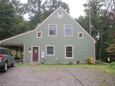 View. SIDE OF HOUSE AND REAR PATIO