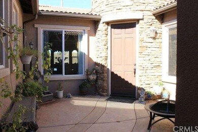 Enjoy this beautiful private courtyard entry.