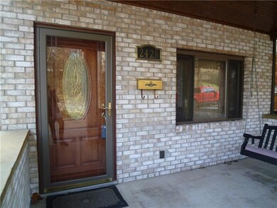 New brick porch, woodgrain bevel glass entry door 