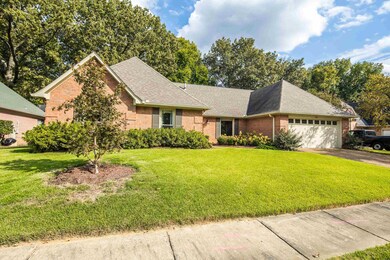 View of front of house featuring a front lawn and 