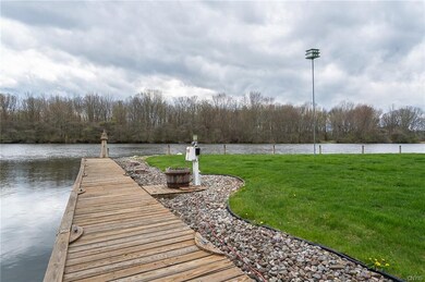 Morning walks with your coffee along this deck could be be a great way to start the day!