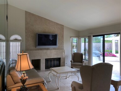 Vaulted ceilings with custom fireplace as focal po