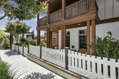 Front yard and patios are fenced from sidewalk.