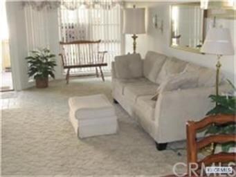 Living room with view of patio.