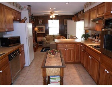 Kitchen. Kitchen is off of formal dining area and