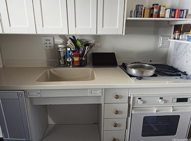 Enhanced kitchen photo with virtual decluttering.