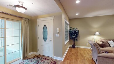 Entry to unit and sliding door access to covered f