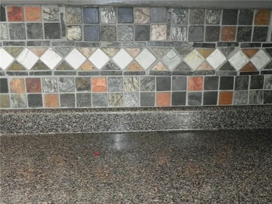 Lovely Tile Backsplash in Kitchen!