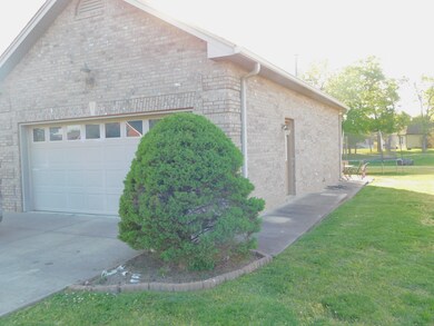 Garage Features a Pedestrian Doorway, Quality Construction - Back Yard Opens to walking trail