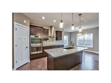 GRANITE COUNTERS, BREAKFAST BAR AND WALK IN PANTRY