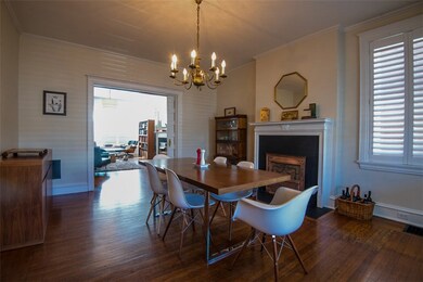 Dining Room - Hardwood floor, Planter shutters, lo