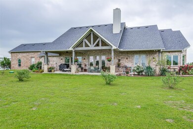 Beautiful porch with amazing views of the back of the property.