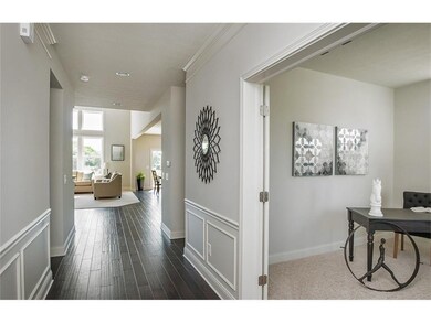 Photo is a model home photo or artist rendering due to construction stage and may be of the same model but possibly at a different location.