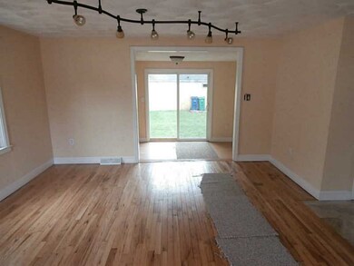 Living Room. to den,media rm