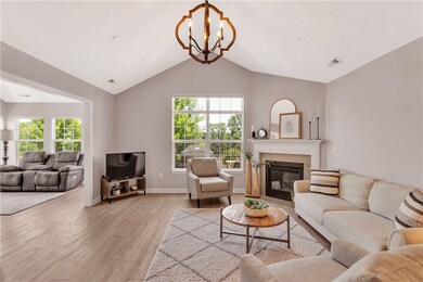 Vaulted ceilings in living room - leading into sun