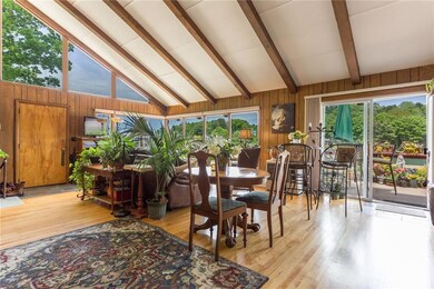 The spacious living-dining room has...