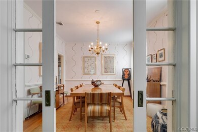 French pocket doors from Living Room to Dining Room and the rest of the condo.