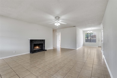 Unfurnished living room with a textured ceiling, 