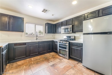 4706 Pinon Pointe Rd, Las Vegas, NV 89115 - photo 6