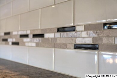 Distinct tile back splash. Subtle and elegant.
