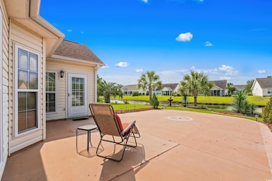 View of patio / terrace featuring a water view and a residential view