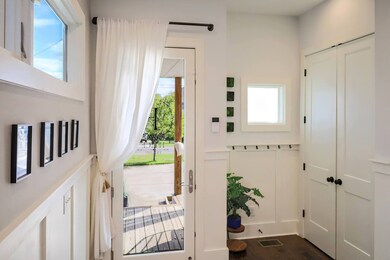 Foyer that offers lots of storage and natural light!