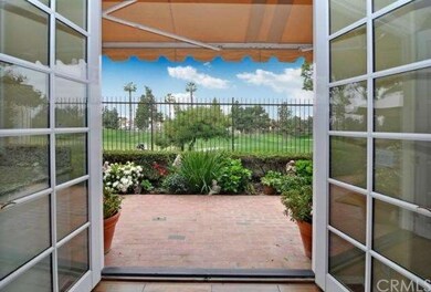 Doors leading out to Brick and Flagstone Patio.