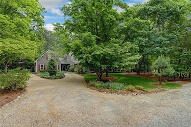 THIS VIEW IS AT THE BEGINNING OF THE DRIVEWAY.