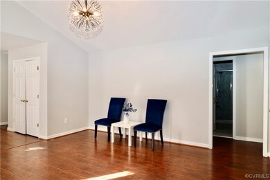 Sitting room featuring dark hardwood / wood-style