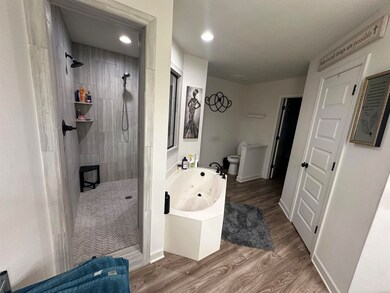 Bathroom with shower with separate bathtub, toilet