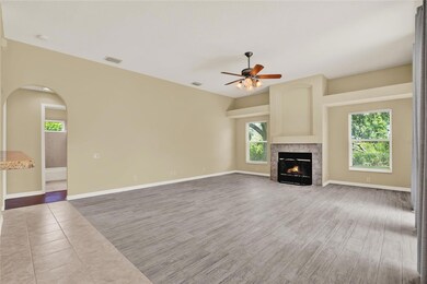Cozy family room with wood burning fireplace